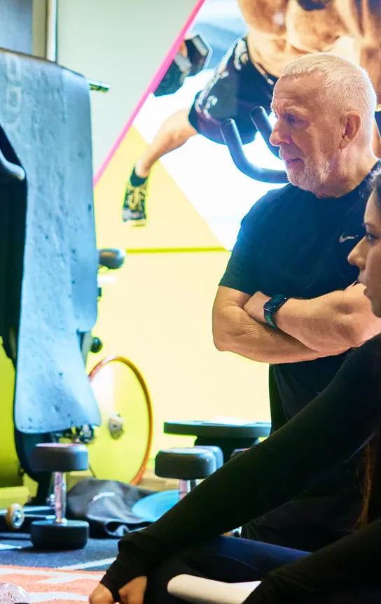 Coach catching up with members in the studio at Avoya Fitness Bromley