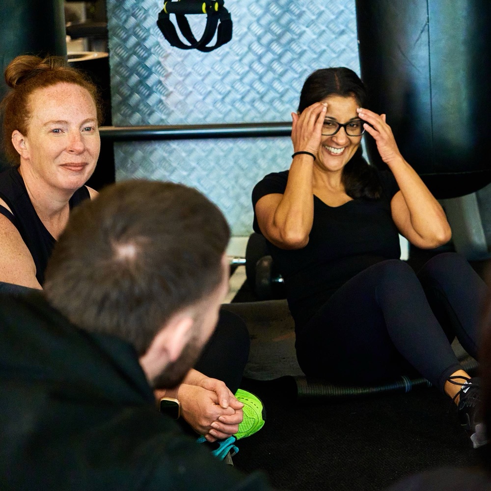 An Avoya member laughing during a group session